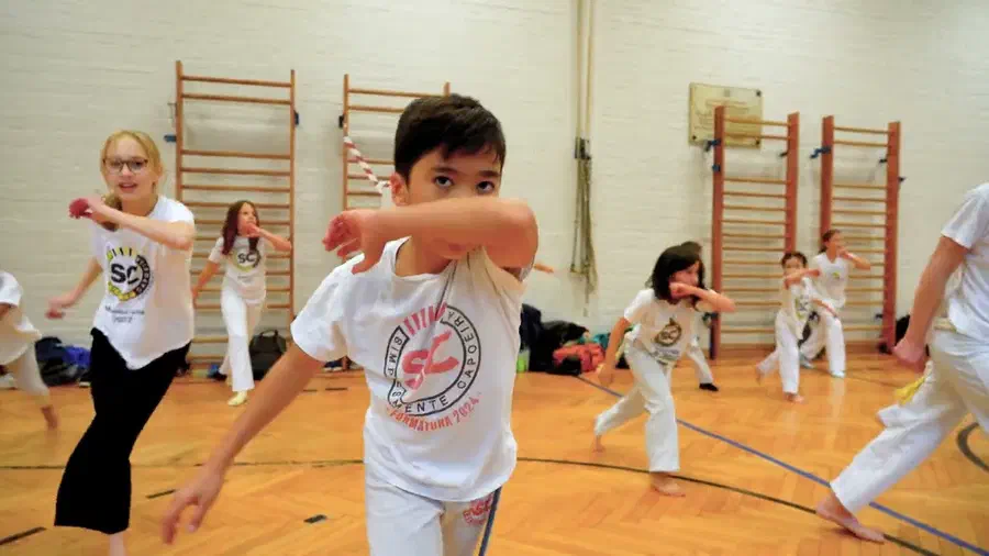 Kids training capoeira together at Simplesmente Capoeira Berlin